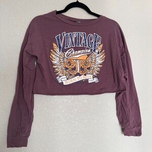Long sleeve top. Burgandy-ish in color.